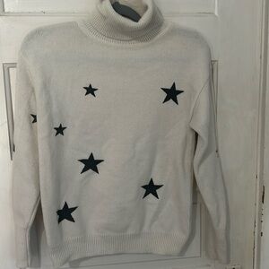 Size medium off-white with black stars turtleneck sweater
